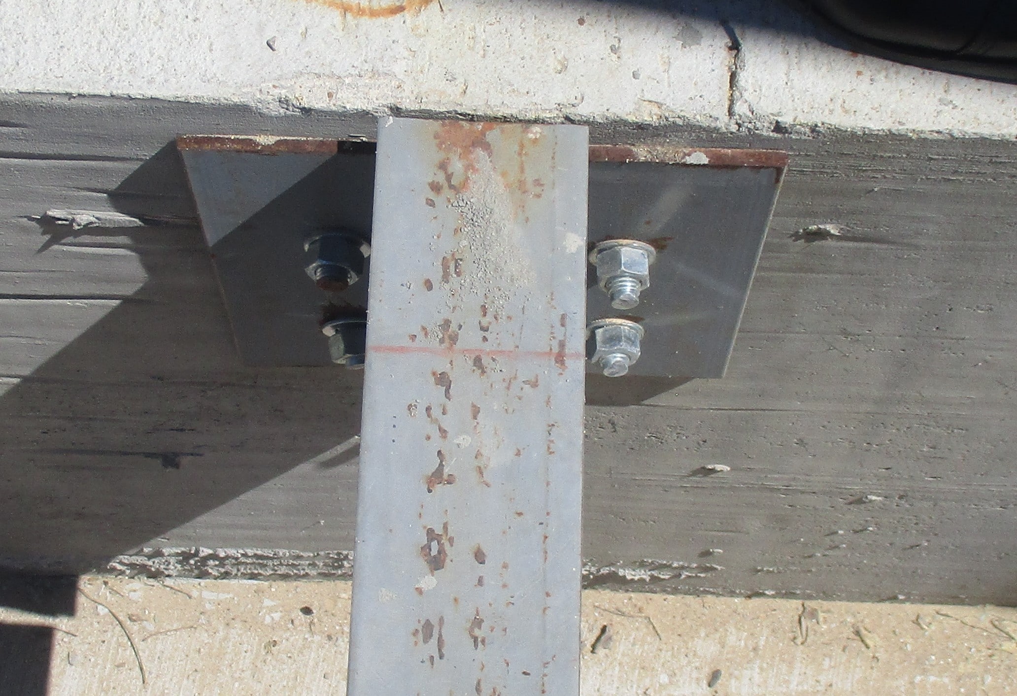 Capacity of postinstalled anchor when not square to concrete