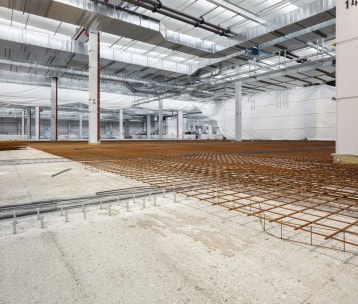 Verstärkung und Instandsetzung von Stahlbetonbauteilen mit Aufbeton