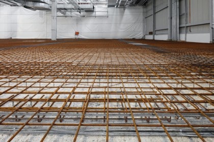 Verstärkung und Instandsetzung von Stahlbetonbauteilen mit Aufbeton